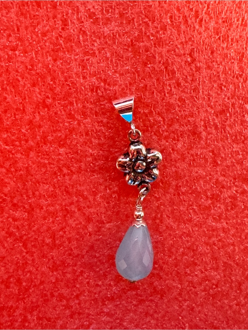 Sterling Silver Floral Pendant with Pale Blue Teardrop Gem